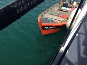 Bote en el que salieron de pesca Ríos y Nieves. (Foto Ricardo Castrodad del Coast Guard.)