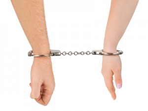 pareja arrestada